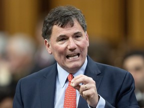 Minister of Public Safety, Democratic Institutions and Intergovernmental Affairs Dominic LeBlanc rises during Question Period, Thursday, Feb. 1, 2024 in Ottawa.