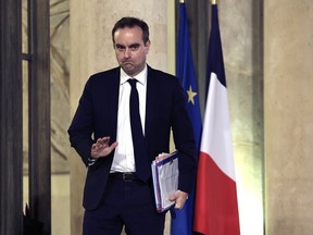 French Defence Minister Sebastien Lecornu waits at the Elysee Palace Thursday, Jan. 26, 2023 in Paris.