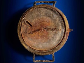 A watch with its hands frozen to the time of the blast in the Hiroshima bombing.