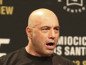 FILE - Joe Rogan is seen during a weigh-in before UFC 211 on Friday, May 12, 2017, in Dallas. Spotify has penned a new multi-year partnership deal with Rogan, Friday, Feb. 2, 2024. The enormously popular show will soon also be available on competing platforms, including YouTube and Apple Podcasts.