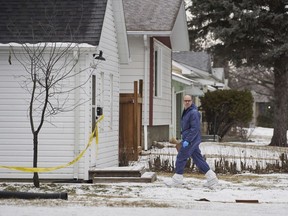 A judge has ordered a Manitoba man accused of killing five family members, including his three young children, undergo a mental health assessment to determine whether he is fit to stand trial. Forensic investigators work at the scene of an ongoing investigation regarding five deaths in southern Manitoba, in Carman, Man., Monday, Feb. 12, 2024.