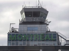 The control tower at Trudeau airport is seen, Tuesday, Dec. 8, 2015 in Montreal.