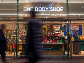 Pedestrians pass The Body Shop store in central London, U.K., on Monday, Oct. 30, 2023.