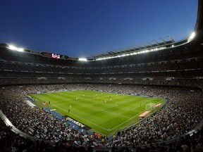 FILE - Real Madrid plays against Valencia during a Spanish La Liga soccer match at the Santiago Bernabeu stadium in Madrid, Spain, May 4, 2014. The NFL is headed to Spain in 2025 for the first regular season game ever in that country. The league announced Friday, Feb. 10, 2024, at the Super Bowl that its international slate of games for the 2025 season will feature a game at Real Madrid's famed Santiago Bernabeu.