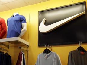 Nike clothes are displayed at a store in Colma, Calif.