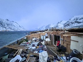 A damaged, blown off roof of a building is seen after a severe storm on Kvaloya island near Tromso, northern Norway, on Jan. 29, 2024.