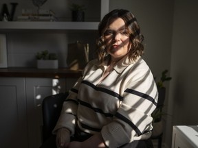 Kirsten Watson, at her home in Waterloo, Ont. on Friday, Feb. 23, 2024. She was weeks away last year from losing access to potentially life-saving medication, a situation she found herself in because Ontario does not cover the cost of take-home cancer drugs.