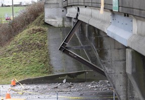 Damage to the 112th Street overpass on Highway 99 after it was struck by a truck carrying large girders on Dec. 28, 2023.