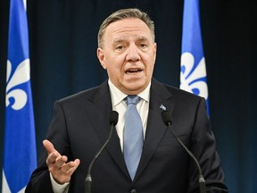 Quebec Premier Francois Legault speaks to the media in Montreal, Thursday, Feb. 29, 2024, where he gave his reaction to the Quebec Court of Appeal's decision on the province's secularism law, known as Bill 21.