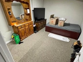 Room for rent that shows twin bed, dresser and TV