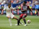 Toronto FC’s Richie Laryea (right) loses the ball to FC Cincinnati’s Yuya Kubo in Cincinnati yesterday