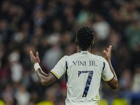 Real Madrid's Vinicius Junior celebrates after scoring his side's second goal during the Champions League Group C match between Real Madrid and Braga at the Santiago Bernabeu stadium in Madrid, Spain, Nov. 8, 2023.