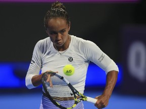 Canada's Leylah Fernandez returns to Kazakstan's Elena Rybakina during the Qatar Open quarter-final in Doha, Qatar, on Thursday, Feb. 15, 2024.