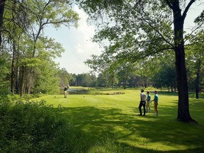 Golfers tee off at Garland Lodge and Golf Resort.