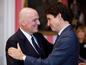 Dominic LeBlanc is pictured alongside Prime Minister Justin Trudeau
