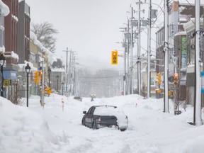 Nova Scotia Health says non-emergency services in its Eastern zone will continue to be reduced following a weekend snowstorm. A truck is abandoned on a snow-covered street after a winter storm in Sydney, N.S. on Monday, Feb.5, 2024.