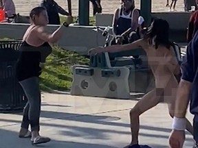 Screenshot of two women fighting with spiked clubs at Venice Beach, Calif.