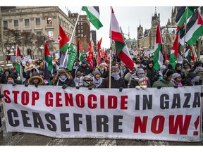Pro-Palestine protesters march in Ottawa on Jan. 7, 2024.