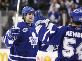 Toronto Maple Leafs' Carlo Colaiacovo celebrates scoring a goal against the Buffalo Sabres.