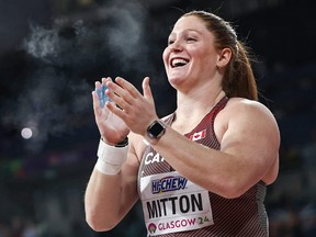 Canada's Sarah Mitton reacts as she competes in the Women's Shot Put final during the Indoor World Athletics Championships.
