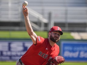 Red Sox pitcher Lucas Giolito works out during spring training.