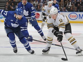 Toronto Maple Leafs' Timothy Liljegren defends against the Boston Bruins.