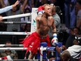 Jake Paul celebrates after defeating Ryan Bourland in the first round during their cruiserweight fight.