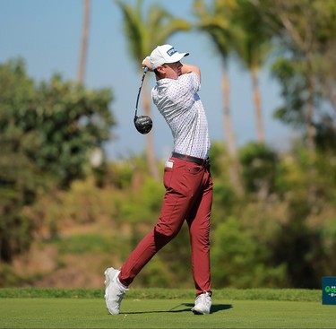 Mackenzie Hughes plays his shot from the 8th tee during the second round of the Mexico Open.