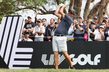 Phil Mickelson of HyFlyers GC hits a tee shot on the 11st hole during day one of the LIV Golf Invitational - Hong Kong.