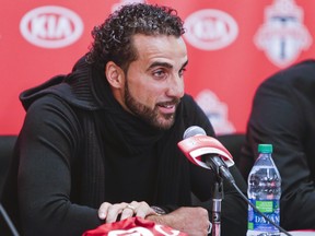 Dwayne De Rosario, Toronto native and former TFC player talks to the media in 2014.
