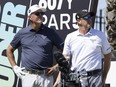 Captain Phil Mickelson of HyFlyers GC and caddie, Tim Mickelson, look on from the 18th hole tee during the practice round before the start of LIV Golf Jeddah.