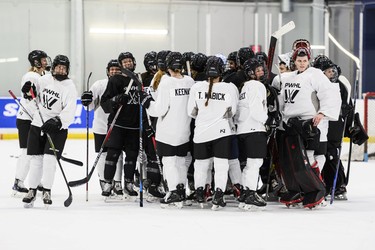 Players of the Toronto squad of the Professional Women's Hockey League break after training camp in Toronto in Nov. 2023.