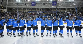 Toronto players salute the crowd after the inaugural PWHL hockey game against New York.