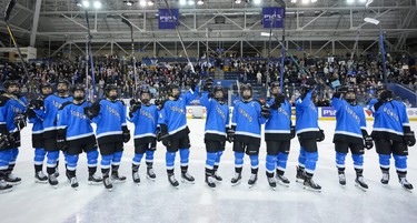 Toronto players salute the crowd after the inaugural PWHL hockey game against New York.