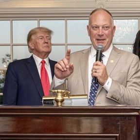 Michigan GOP lawmaker Matt Maddock (right) with former U.S. president Donald Trump.