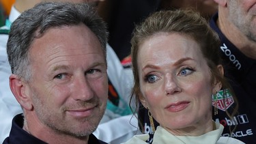 Red Bull Racing team principal Christian Horner along with his wife, Spice Girls singer Geri Halliwell, attends the podium ceremony of the Saudi Arabian Formula One Grand Prix at the Jeddah Corniche Circuit in Jeddah on March 9, 2024.