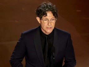 Jonathan Glazer accepts the Best International Feature Film award for "The Zone of Interest" onstage during the 96th Annual Academy Awards at Dolby Theatre on March 10, 2024 in Hollywood, California.