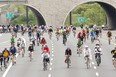Thousands of cyclists ride down the Don Valley Parkway, between Lawrence Ave. E. and Wynford Dr., during the annual Becel for Heart & Stroke Ride for Heart in 2020.