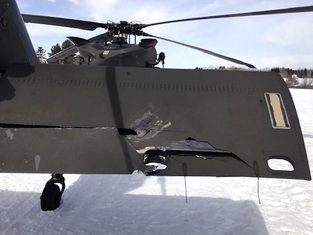 Man who crashed snowmobile into parked Black Hawk suing for 9.5M