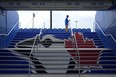 An usher waits for fans to arrive at TD Ballpark before a spring training baseball game between the Toronto Blue Jays and the Philadelphia Phillies Monday, March 4, 2024, in Dunedin, Fla.