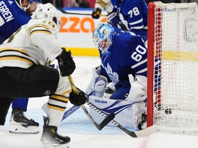 Boston Bruins' Pavel Zacha scores on Maple Leafs goaltender Joseph Woll during the third period in Toronto on Monday, March 4, 2024.
