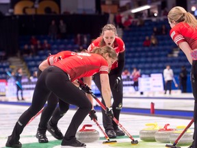 Team Canada skip Rachel Homan of Ottawa follows her front end (L) lead Sara Wilkes, 2nd. Emma Miskew during draw 7 against team Norway. Curling Canada/ Michael Burns Photo