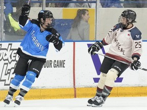 Toronto's Emma Maltais celebrates after scoring as Montreal's Melodie Daoust looks on during third period PWHL action, in Toronto, Friday, March 8, 2024.