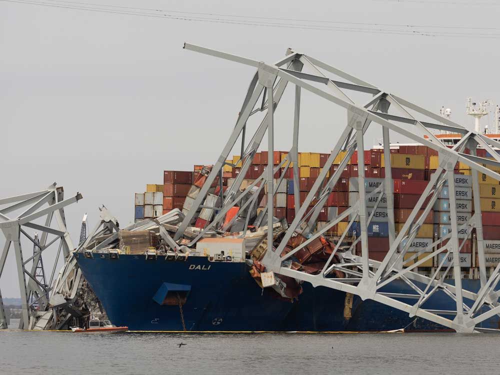 Crews carefully start removing steel from collapsed Baltimore bridge ...