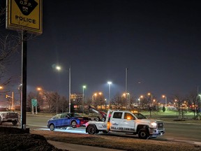 A vehicle is towed after a Toronto driver was found asleep at the wheel. He was charged with impaired driving.