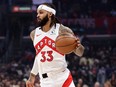 Gary Trent Jr. of the Raptors dribbles up the court against the Clippers during first half NBA action at Crypto.com Arena in Los Angeles, Jan. 10, 2024.