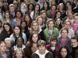 Crowd of women looking upwards, portrait, elevated view