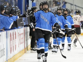 Toronto's Hannah Miller celebrates after scoring her team's opening goal against Montreal during first period PWHL action, in Toronto, Friday, March 8, 2024.
