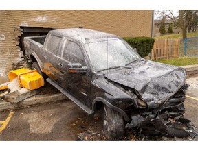 A pickup truck was struck by a vehicle, sending it through the wall of a townhouse at Berkshire Dr. at about 2:30 a.m. on Sunday March 17, 2024, residents say. Mike Hensen/ The London Free Press