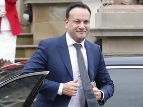 Irish Prime Minister Leo Varadkar gets out of his car as he goes to meet Northern Ireland's First Minister Michelle O'Neill and Deputy First Minister Emma Little-Pengelly, in Belfast, Northern Ireland, Feb. 5, 2024.